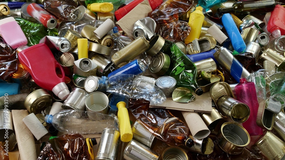 Plastic glass metal paper cardboard waste and recycling. Sorted recyclables materials. Waste sorting center. Recycling collection