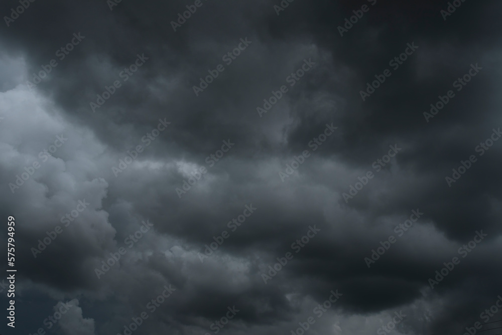 Dramatic dark storm thundercloud rain clouds on black sky background. Dark thunderstorm clouds ...