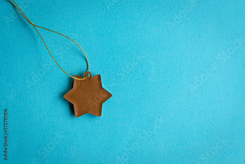 Star shape tag on blue background. Copy space. Template or mockup for text.
