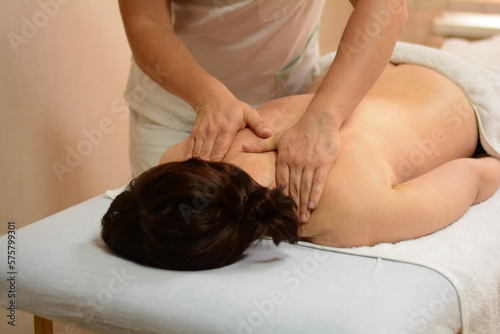 person receiving back massage