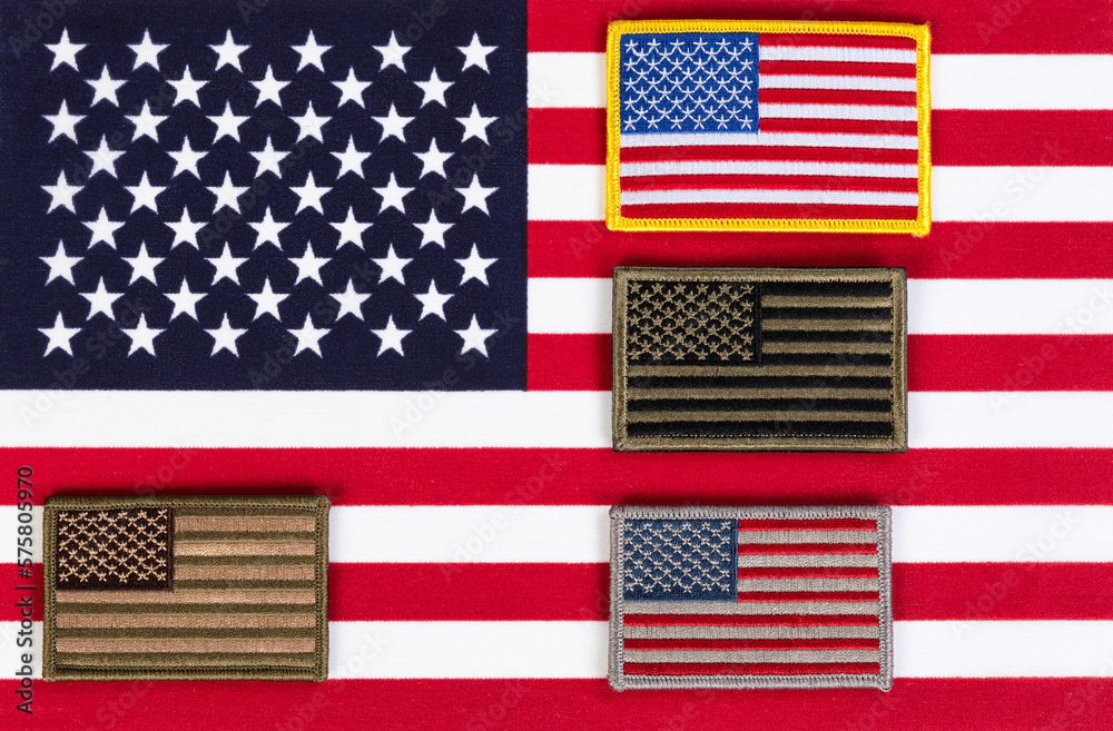 United States flag with smaller uniform military flags for Independence, Veterans or Memorial Day holiday background United States flag with smaller uniform military flags for Independence, Veterans or Memorial Day holiday background