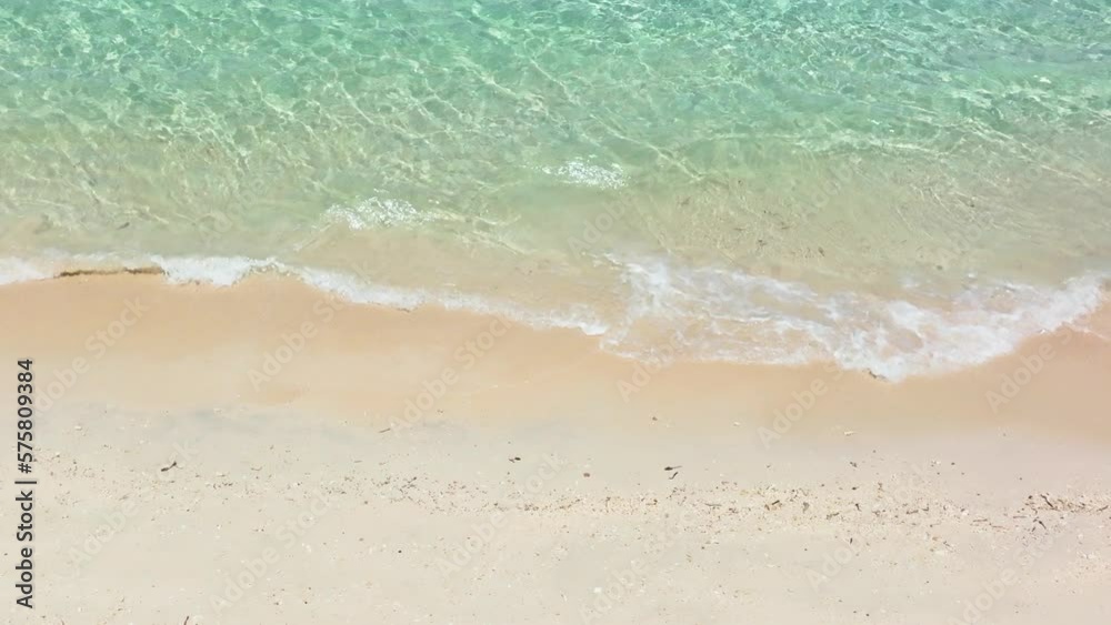 Beautiful sandy beach and sea surf with waves in slow motion. Philippines Beautiful sandy beach and sea surf with waves in slow motion. Philippines