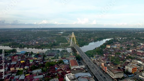 Aerial view of Siak Bridge IV (Abdul Jalil Alamuddin Syah Bridge) above Siak River (Sungai Siak) in Pekanbaru top view. Pekanbaru photo