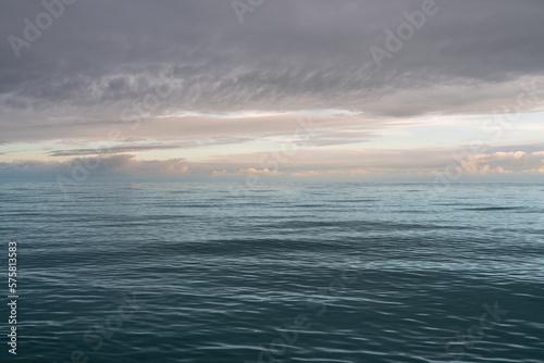 View of the Black Sea on the coast of Sochi against the sunset sky, Sochi, Krasnodar Krai, Russia