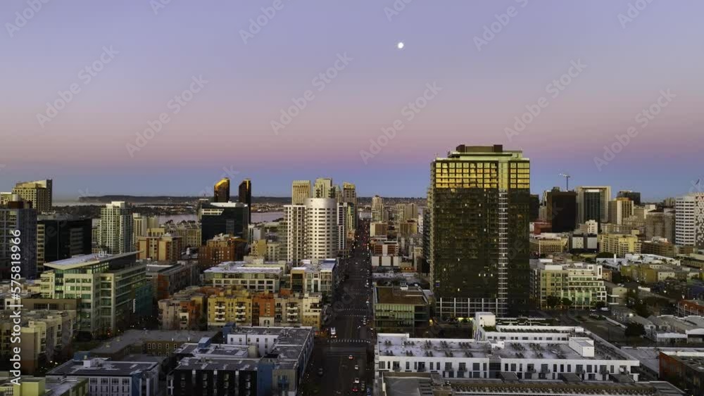 Aerial view over streets of downtown San Diego, dusk in California, USA - reverse, drone shot Aerial view over streets of downtown San Diego, dusk in California, USA - reverse, drone shot