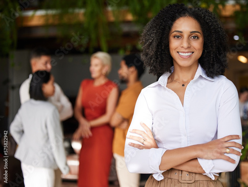 Portrait, business and smile of black woman with arms crossed and pride for career or job. Boss, professional mindset and happy, proud and confident female entrepreneur from South Africa in office.