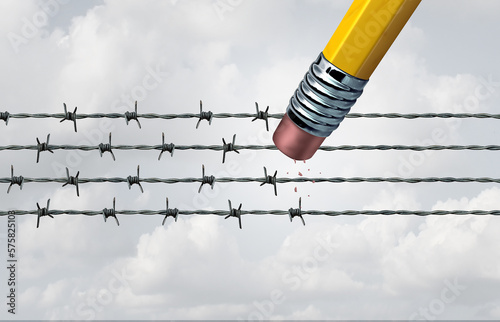 Eliminating Oppression and fighting for the oppressed by liberation as a pencil eraser erasing the barbed wires resulting in freedom and liberty as a justice symbol photo