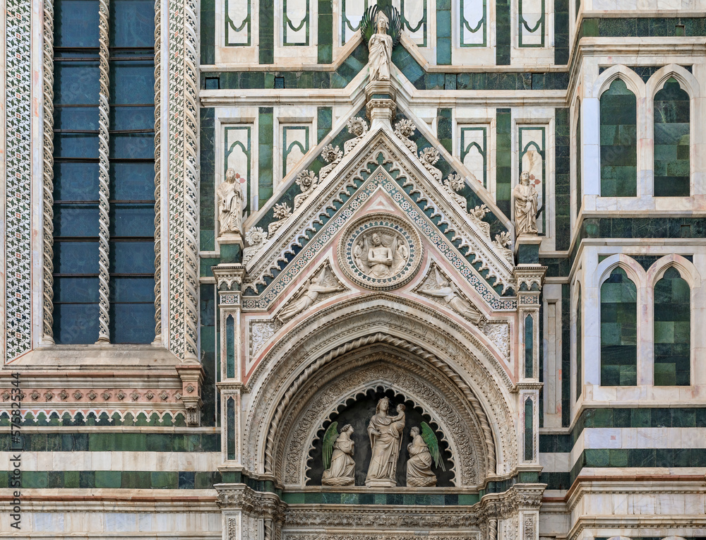 Ornate marble facade of the famous Duomo Cathedral in Florence, Italy