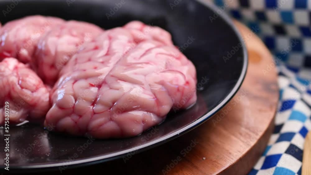 mutton brain on a chopping board mutton brain on a chopping board
