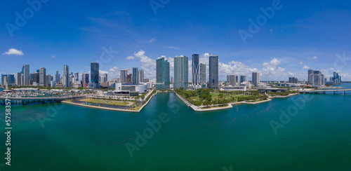 Museum Park baywalk on a cityscape aerial view at Miami Beach, Florida. Baywalk park at the center of the modern cityscape with waterfront and blue sky background.