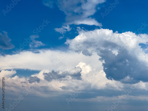 Blue sky with beautiful clouds on a daytime. Skyscape background.