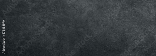 black white concrete wall , grunge stone texture , dark gray rock surface background panoramic wide banner