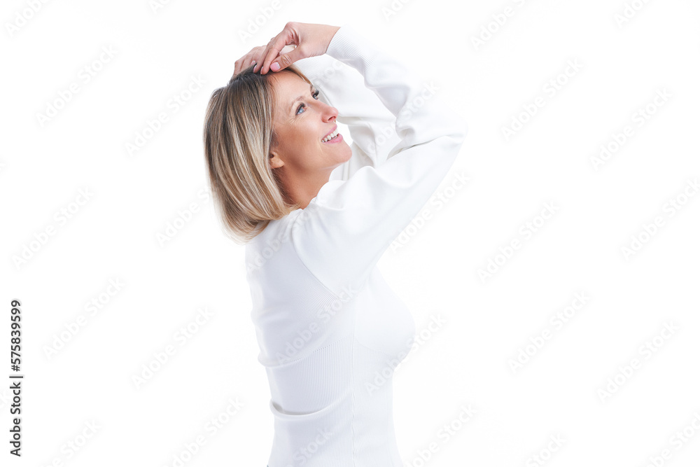 Picture of blonde woman happy dancing isolated over white background 
