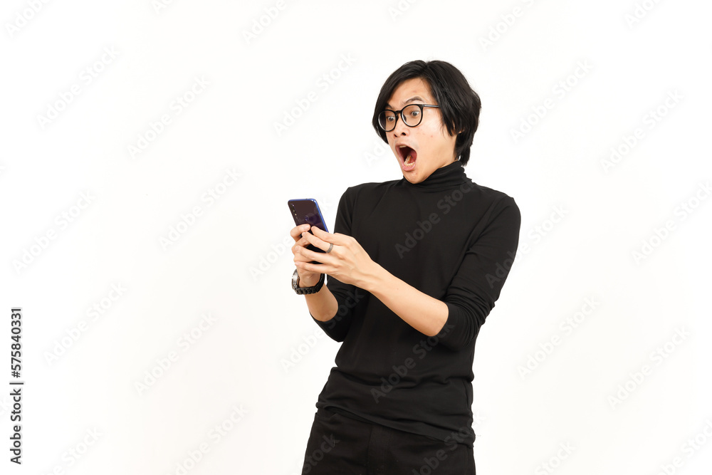 Holding and Using Smartphone With Shocked Face Of Handsome Asian Man Isolated On White Background Holding and Using Smartphone With Shocked Face Of Handsome Asian Man Isolated On White Background