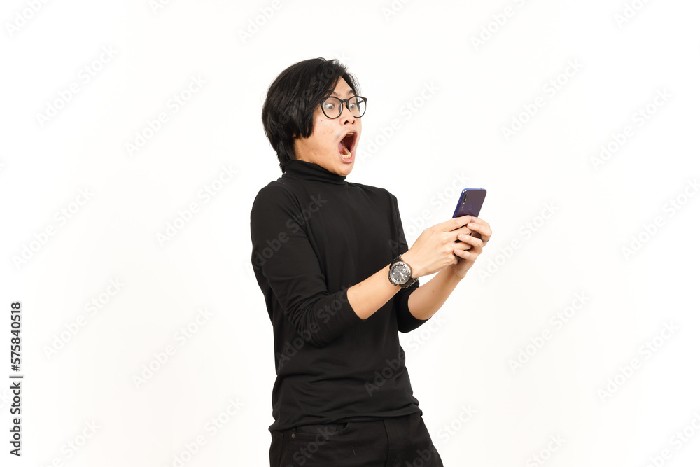 Holding and Using Smartphone With Shocked Face Of Handsome Asian Man Isolated On White Background Holding and Using Smartphone With Shocked Face Of Handsome Asian Man Isolated On White Background