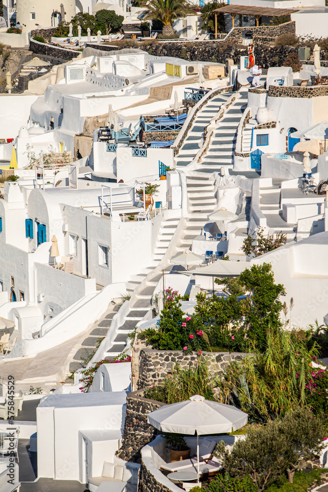Naklejka premium Domes, steeples, bells and white buildings of Santorini, Greece 