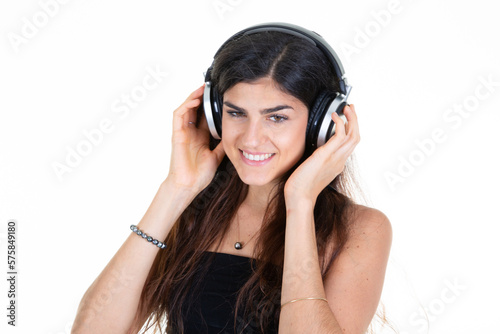 cheerful young woman smiling beauty brunette listening music at headphones