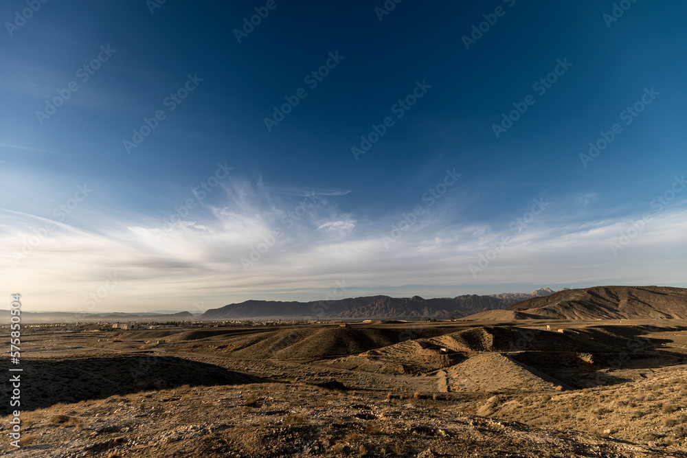 Arid land in the mountains, clouds with blue sky, Quetta Valley 
