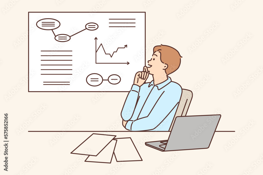 Man corporate manager happily looking at growing charts of increasing profits Man corporate manager happily looking at growing charts of increasing profits