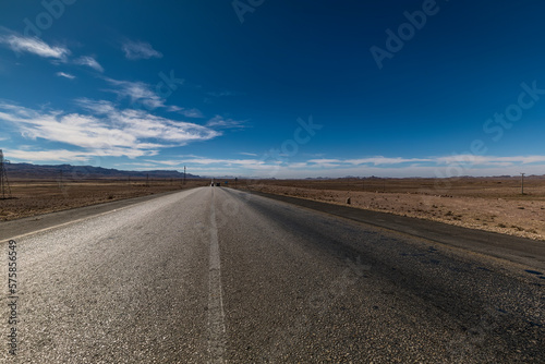 Arid land and the RCD  Pakistan - Iran  highway  with blue sky and empty space  Quetta  Pakistan