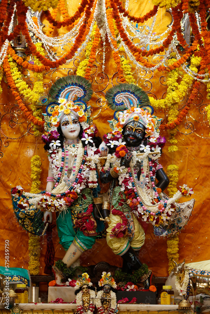 Balaram and Krishna murthis in the central alter of the Krishna-Balaram temple, Vrindavan. India.