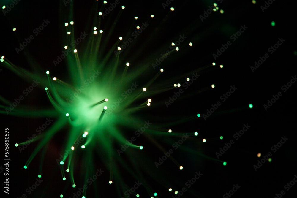 Color fiber optical background on black, Fiber optics lights abstract background, Closeup, fiber optics on defocused background. Color fiber optical background on black, Fiber optics lights abstract background, Closeup, fiber optics on defocused background.