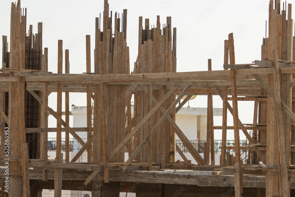 unfinished house in the city as background