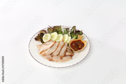 Grilled Pork Neck, Grilled Pork With Spicy sauce on a white plate, yummy Thai Food.