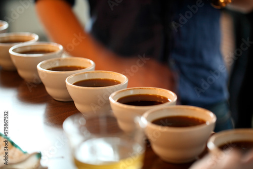 Row of black coffee cups in coffee shop, Castelvetro Di Modena, Emilia-Romagna, Italy photo
