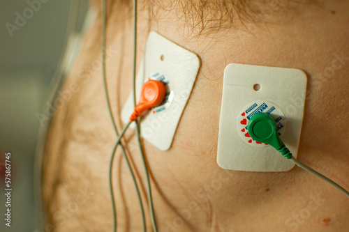 ECG or EKG holter test of man.