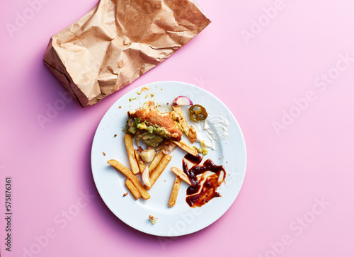 Studio shot of half eaten fast food meal photo