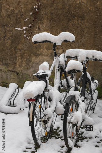 Bikes covered in snow - citylife in winter
