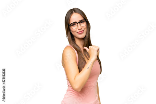 Young pretty caucasian woman over isolated background proud and self-satisfied