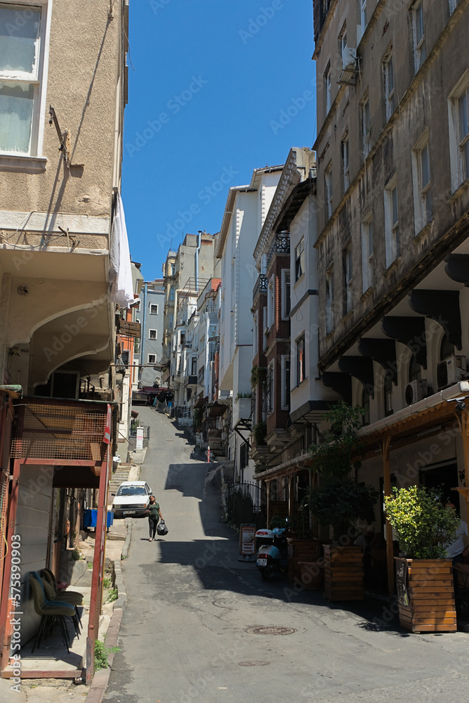 Narrow streets on steep slopes lined with paving stones in the center of Istanbul
