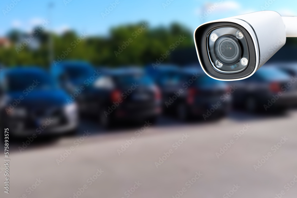 Closeup outdoor CCTV camera at a car parking lot. Closeup outdoor CCTV camera at a car parking lot.