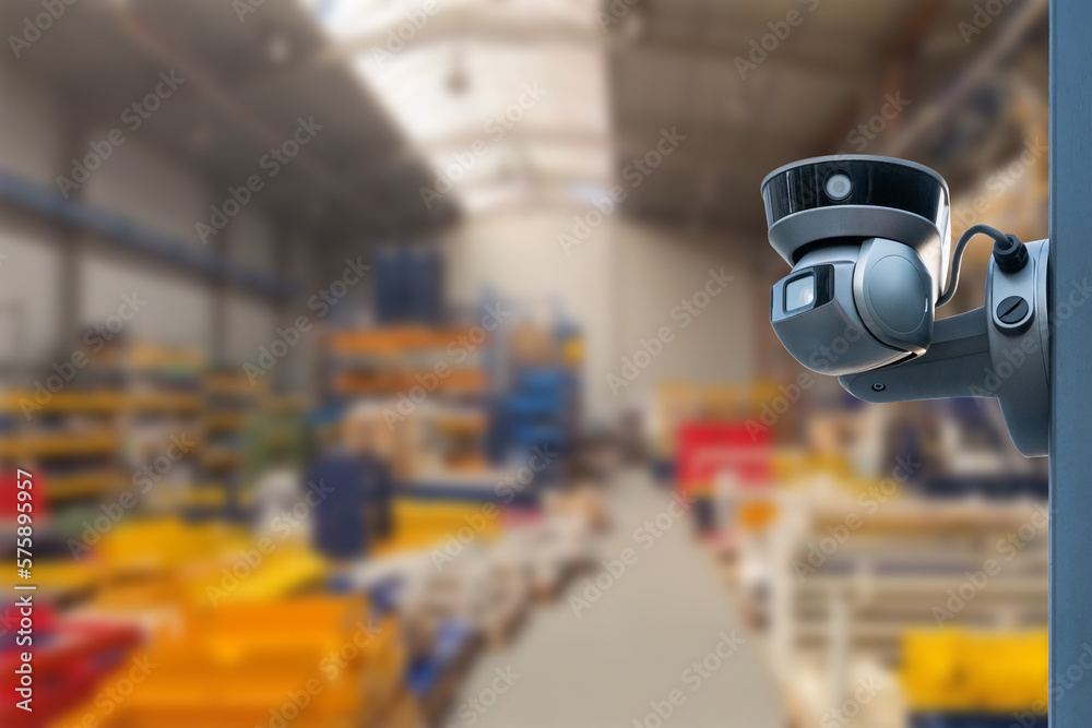 CCTV Camera or surveillance operating inside industrial factory. Copy space. CCTV Camera or surveillance operating inside industrial factory. Copy space.