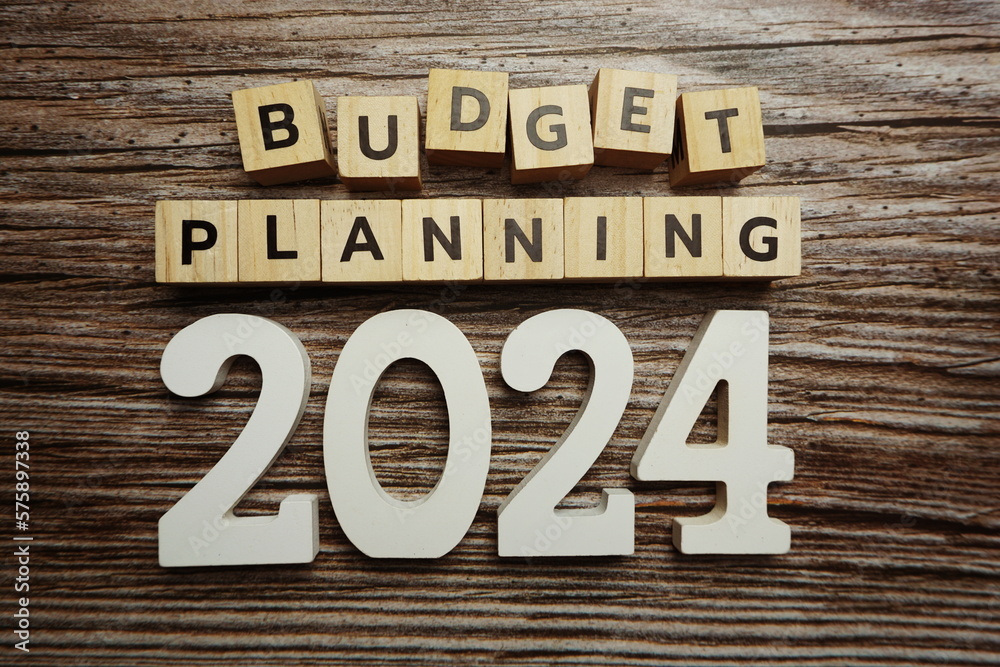 Budget Planning 2024 alphabet letters on wooden background Budget Planning 2024 alphabet letters on wooden background