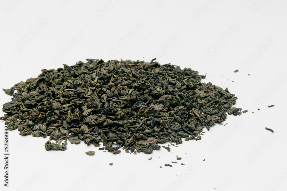 Heap of dry green tea isolated on white background Heap of dry green tea isolated on white background