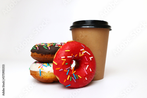 Wallpaper Mural a paper craft cup with coffee or tea and donuts of different flavors on a white background Torontodigital.ca
