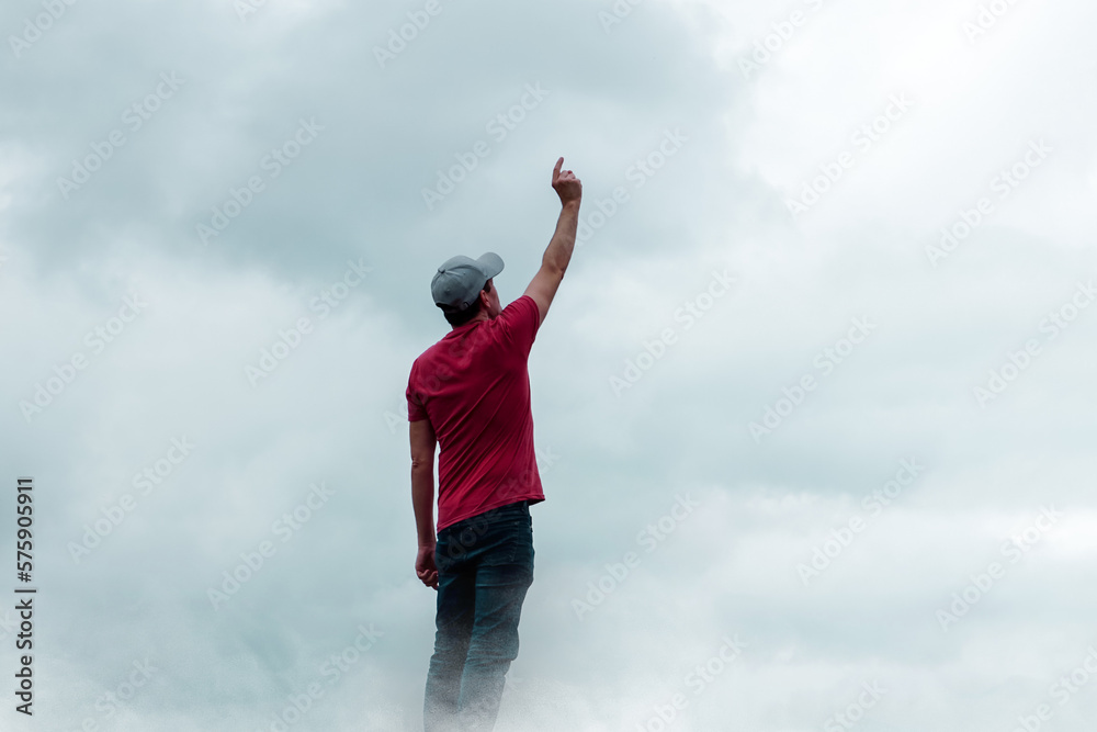 man portrait gesturing in the sky and clouds man portrait gesturing in the sky and clouds