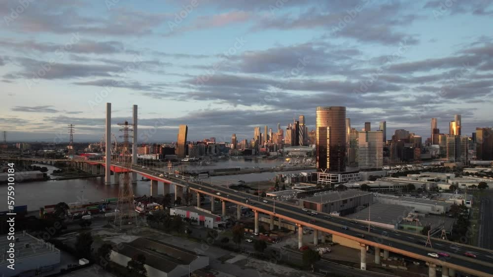 Traffic on the Bolte bridge aerial static sunset, Melbourne skyline Traffic on the Bolte bridge aerial static sunset, Melbourne skyline