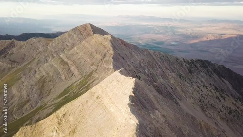 beautiful early morning sunrise over mt nebo salt lake city utah - AERIAL RISE TILT photo