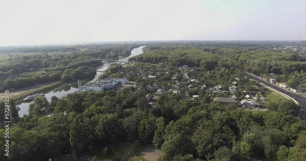 Drone flight, aerial view of the southern suburban part of Chernihiv, surrounded by dense forests, on the river Desna passenger pleasure boats Drone flight, aerial view of the southern suburban part of Chernihiv, surrounded by dense forests, on the river Desna passenger pleasure boats