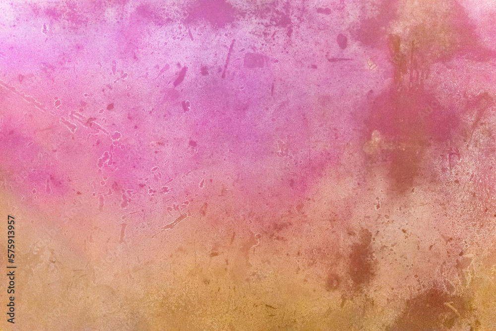 Obraz premium Abstract colorful background of a rusty purple yellow orange surface. The color gradients of the background are reminiscent of watercolors.