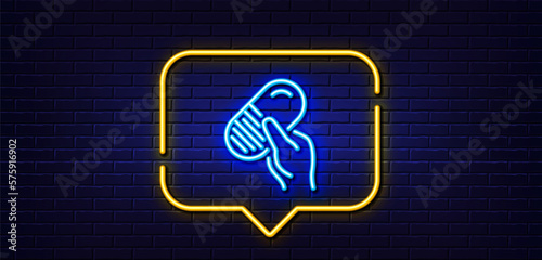 Neon light speech bubble. Capsule pill line icon. Medical drugs sign. Pharmacy medication symbol. Neon light background. Capsule pill glow line. Brick wall banner. Vector