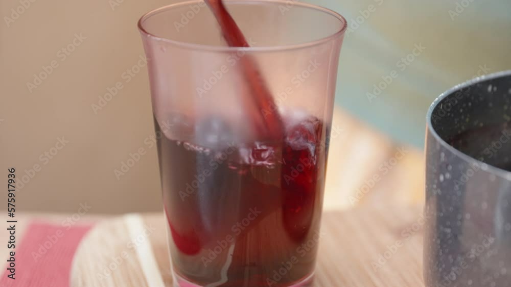 We paint and cook eggs for Easter. I pour an egg in a glass, with red dye from kaskade. close-up. We paint and cook eggs for Easter. I pour an egg in a glass, with red dye from kaskade. close-up.