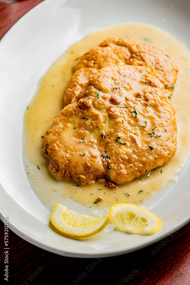 Foto de Italian Chicken Parmesan or parmigiana. Italian comfort dish