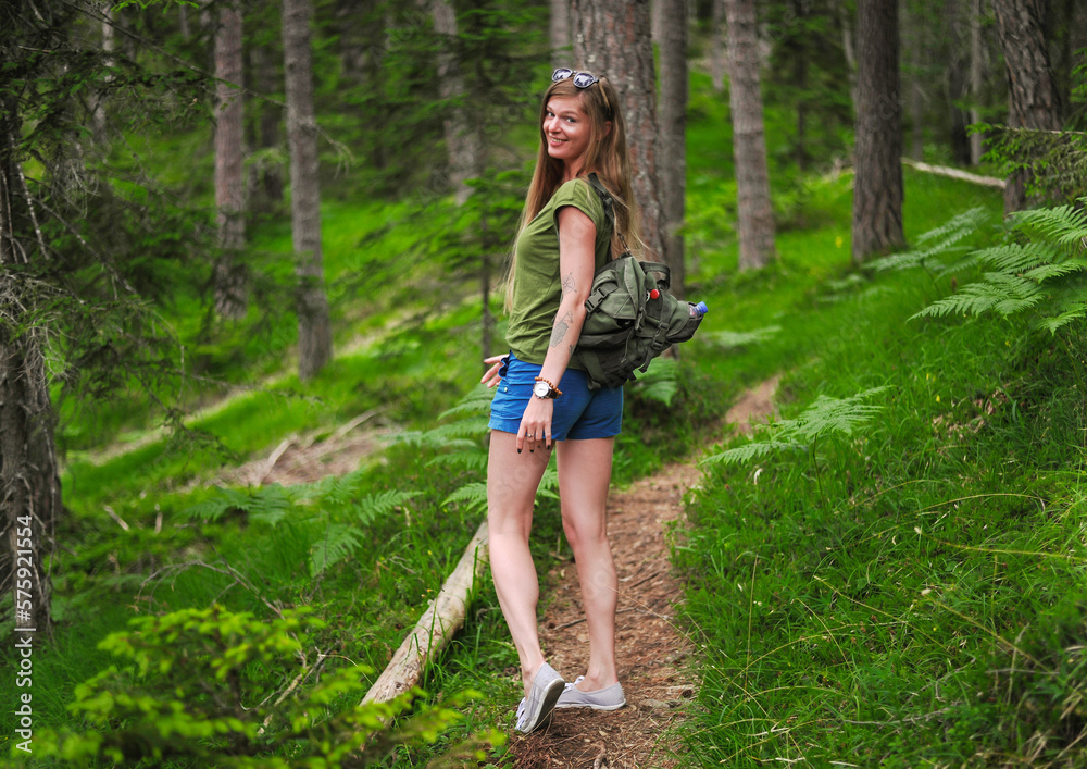 charming cute smiling girls with an open, honest faces against a forest in a soft light charming cute smiling girls with an open, honest faces against a forest in a soft light