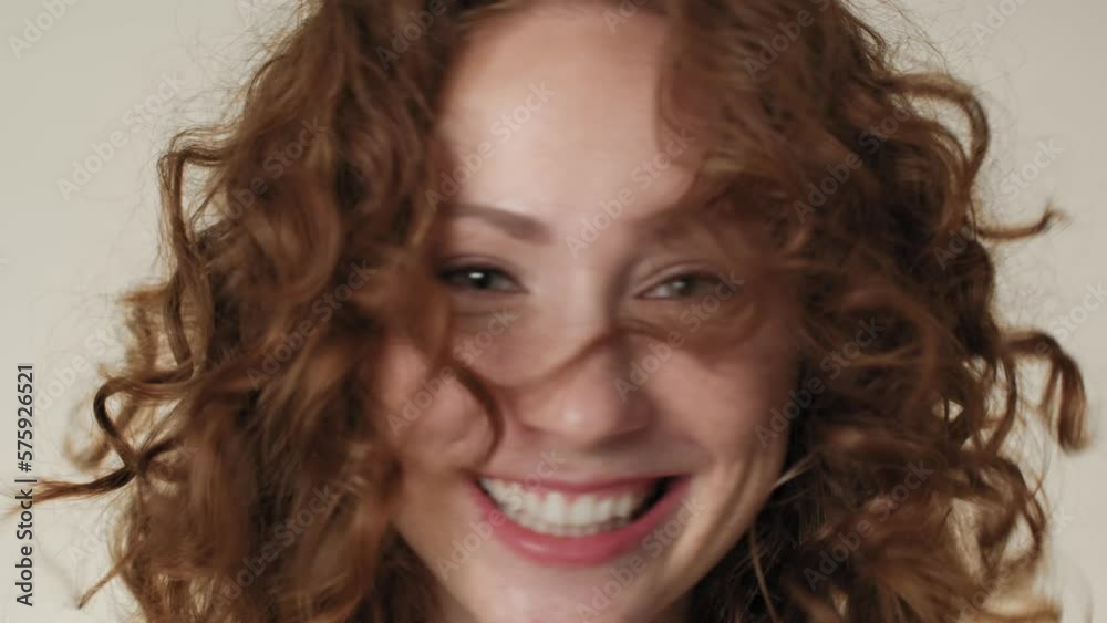 Close up portrait of cheerful caucasian red head woman in underwear in the studio. Shot with RED helium camera in 8K. Close up portrait of cheerful caucasian red head woman in underwear in the studio. Shot with RED helium camera in 8K.