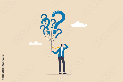 Obraz na płótnie Question marks, finding solution or search for answer, solving problem or curiosity, questionnaire, FAQ or uncertainty concept, doubtful businessman holding question marks balloon look for solutions